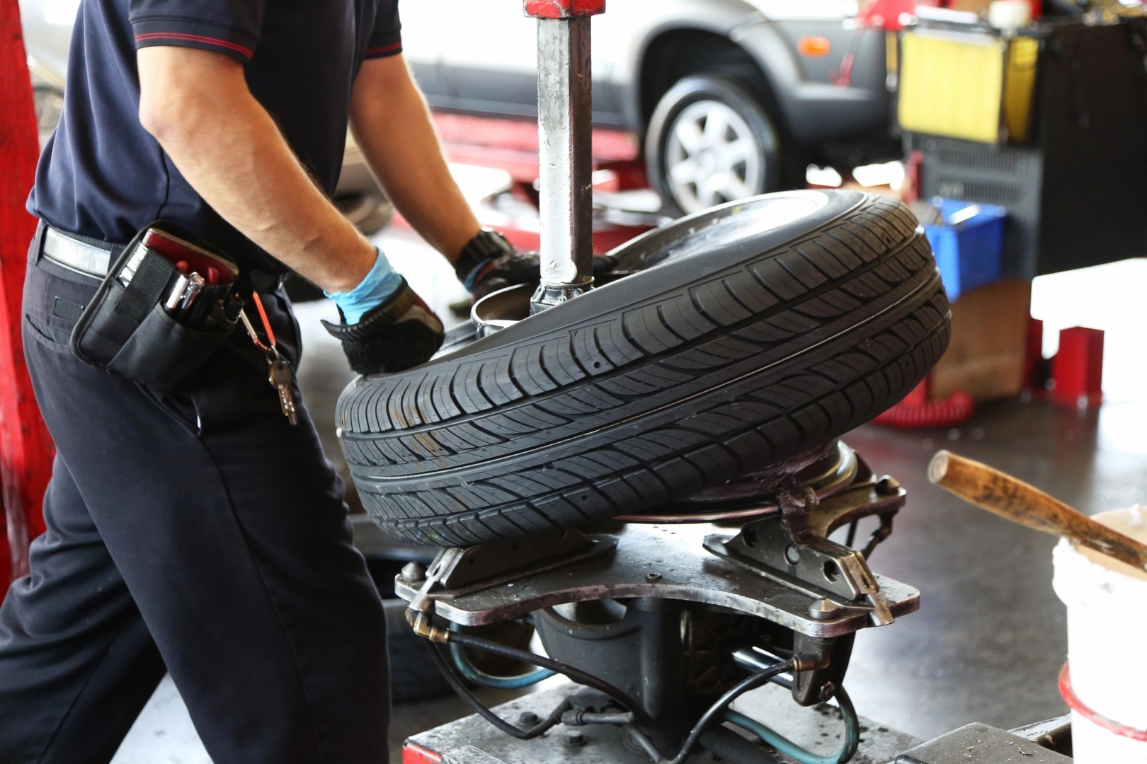 A person repairing a tire